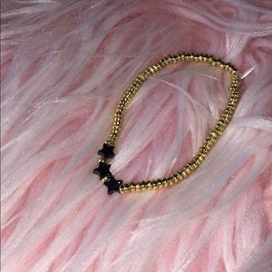 Gold and gray star bracelet